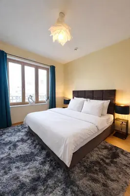 Ein Bett oder Betten in einem Zimmer der Unterkunft Luxus Apartment am Ku'damm - 3 Zimmer