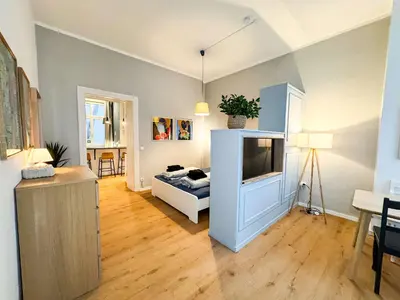 Ein Bett oder Betten in einem Zimmer der Unterkunft Cozy and compact in the center of Pberg