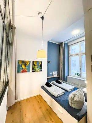 Ein Bett oder Betten in einem Zimmer der Unterkunft Cozy and compact in the center of Pberg