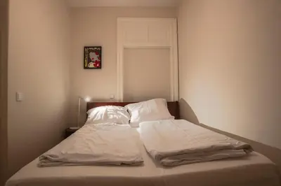 Ein Bett oder Betten in einem Zimmer der Unterkunft High-End Suite direkt am Rosenthaler Platz - AP3