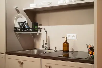 Küche/Küchenzeile in der Unterkunft High-End Suite direkt am Rosenthaler Platz - AP3
