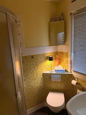 Ein Badezimmer in der Unterkunft Häuschen am Vielitzsee mit großem Garten
