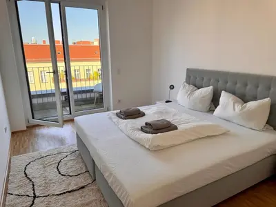 Ein Bett oder Betten in einem Zimmer der Unterkunft Central Berlin Ku'damm Apartment