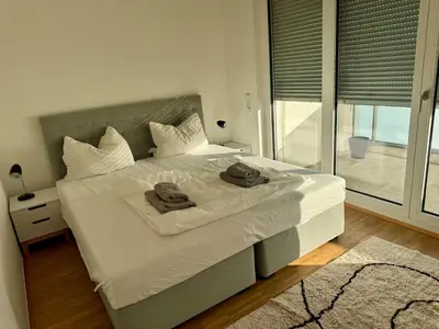 Ein Bett oder Betten in einem Zimmer der Unterkunft Central Berlin Ku'damm Apartment