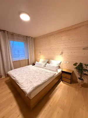 Ein Bett oder Betten in einem Zimmer der Unterkunft Gartenwohnung Appartements am Radweg stille Pauline
