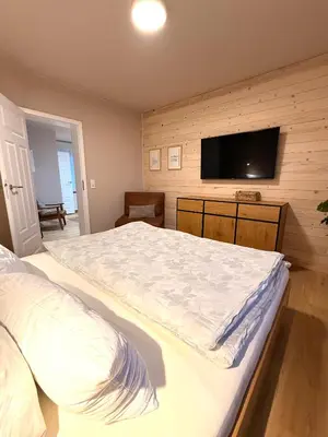Ein Bett oder Betten in einem Zimmer der Unterkunft Gartenwohnung Appartements am Radweg stille Pauline
