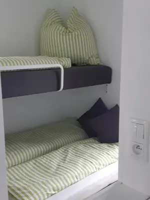 Ein Bett oder Betten in einem Zimmer der Unterkunft Hausboot Havelrobbe