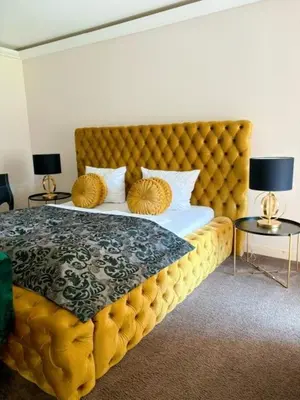 Ein Bett oder Betten in einem Zimmer der Unterkunft Schloss Kartzow