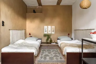 Ein Bett oder Betten in einem Zimmer der Unterkunft Landhauswolfsruh - Historischer Dreiseitenhof in Brandenburg - Sauna - Familie-Freunde-Retreat