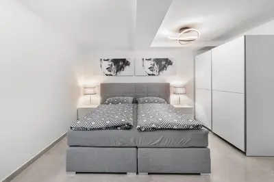 Ein Bett oder Betten in einem Zimmer der Unterkunft Potsdamer Designer Wohnung