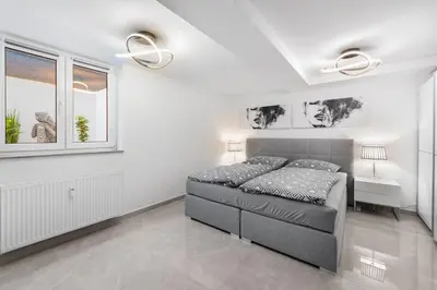 Ein Bett oder Betten in einem Zimmer der Unterkunft Potsdamer Designer Wohnung