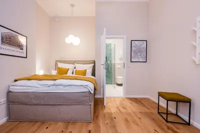 Ein Bett oder Betten in einem Zimmer der Unterkunft Moderne Design Apartments im Herzen von Prenzlauer Berg