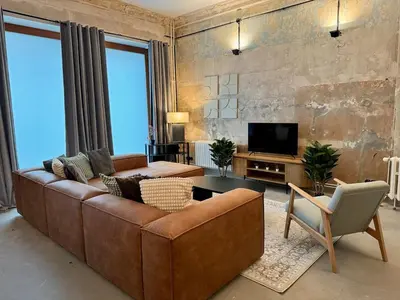 TV/Unterhaltungsangebot in der Unterkunft Cool Industrial Flat for 5
