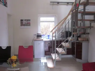 Küche/Küchenzeile in der Unterkunft Holiday Home Moderne Maisonette-Wohnung mit Terrasse by Interhome