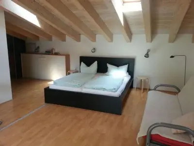 Ein Bett oder Betten in einem Zimmer der Unterkunft Apartment Moderne Studiowohnung im Obergeschoss mit Balkon by Interhome