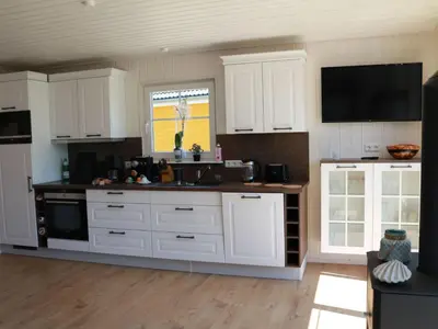 Küche/Küchenzeile in der Unterkunft Holiday Home Hafendorf Zerpens by Interhome