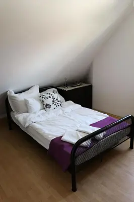 Ein Bett oder Betten in einem Zimmer der Unterkunft Holiday Home für 6 Personen ca- 120 m² in Zepernick- Brandenburg - Berlin und Umgebung by Interhome