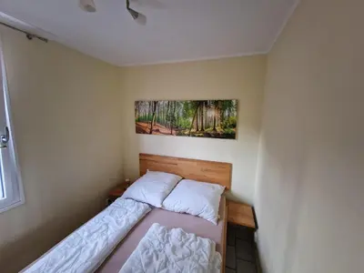 Ein Bett oder Betten in einem Zimmer der Unterkunft Holiday Home Ferienanlage Am Sidowsee by Interhome