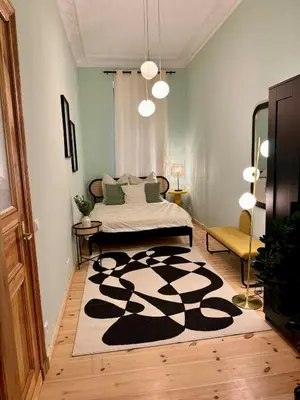 Ein Bett oder Betten in einem Zimmer der Unterkunft Cute Flat in Prenzlauer Berg