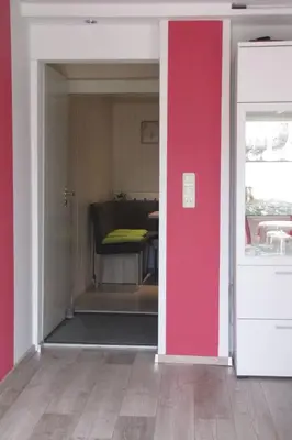 Ein Bett oder Betten in einem Zimmer der Unterkunft Holiday Home Nettes Ferienhaus in Hartmannsdorf mit Garten- Terrasse und Grill by Interhome