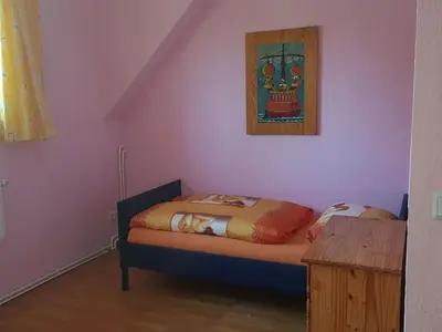 Ein Bett oder Betten in einem Zimmer der Unterkunft Holiday Home Roswitha 2 by Interhome
