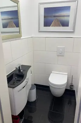 Ein Badezimmer in der Unterkunft Apartment Penthouse Yachthafen by Interhome