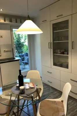 Küche/Küchenzeile in der Unterkunft Holiday Home Reetdach Ferienhaus am Lübbesee Sauna Bootsteg neu by Interhome