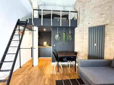 Ein Sitzbereich in der Unterkunft Cozy Studio for 4 on Prenzlauer Allee