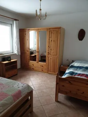Ein Bett oder Betten in einem Zimmer der Unterkunft Waldhaus-Seenlandschaft
