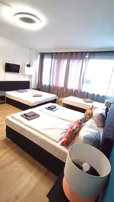 Ein Bett oder Betten in einem Zimmer der Unterkunft BIG Central City Apartments in Schöneberg
