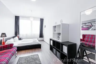 Ein Bett oder Betten in einem Zimmer der Unterkunft BIG Central City Apartments in Schöneberg