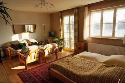 Ein Bett oder Betten in einem Zimmer der Unterkunft Pension Pichelsdorf