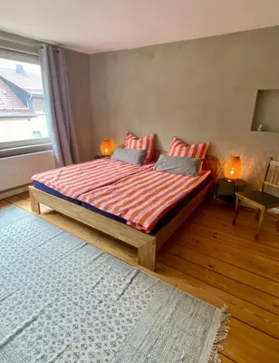 Ein Bett oder Betten in einem Zimmer der Unterkunft Käthes Sommerfrische