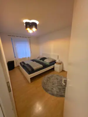 Ein Bett oder Betten in einem Zimmer der Unterkunft Ruhig gelegene 59,25qm Erdgeschosswohnung