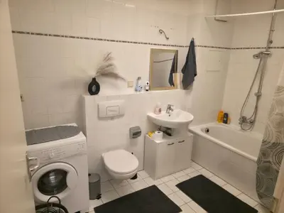 Ein Badezimmer in der Unterkunft Ruhig gelegene 59,25qm Erdgeschosswohnung