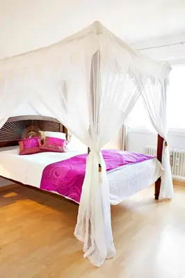 Ein Bett oder Betten in einem Zimmer der Unterkunft Morgenland Ferienwohnung