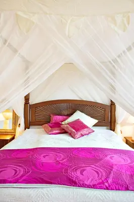 Ein Bett oder Betten in einem Zimmer der Unterkunft Morgenland Ferienwohnung