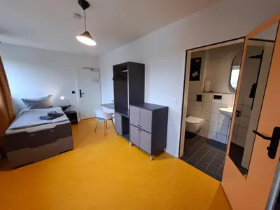 Ein Bett oder Betten in einem Zimmer der Unterkunft KulturHaus Locktow