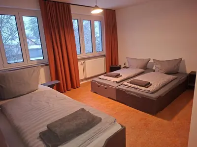 Ein Bett oder Betten in einem Zimmer der Unterkunft KulturHaus Locktow