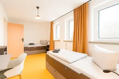 Ein Bett oder Betten in einem Zimmer der Unterkunft KulturHaus Locktow