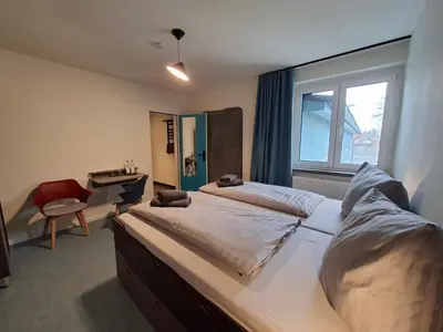 Ein Bett oder Betten in einem Zimmer der Unterkunft KulturHaus Locktow