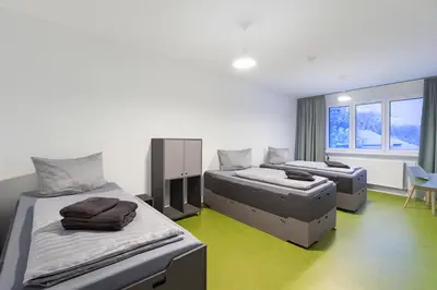 Ein Bett oder Betten in einem Zimmer der Unterkunft KulturHaus Locktow