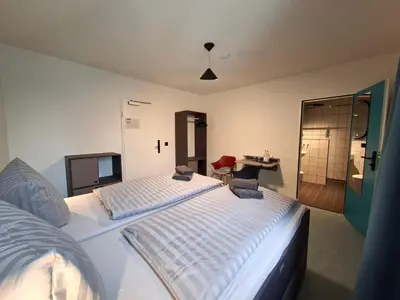 Ein Bett oder Betten in einem Zimmer der Unterkunft KulturHaus Locktow