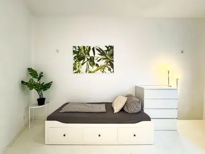 Ein Bett oder Betten in einem Zimmer der Unterkunft Spacious Apartment for 7 with Cinema Room