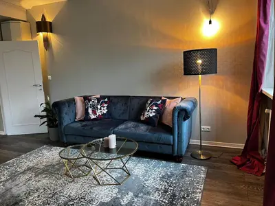 Ein Sitzbereich in der Unterkunft New modern City West Apartment