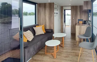 Ein Sitzbereich in der Unterkunft 1 Bedroom Stunning Ship In Havelsee Ot Kützkow