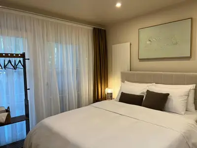 Ein Bett oder Betten in einem Zimmer der Unterkunft ALEXA 2x Chic Design Apartment up to 15 persons