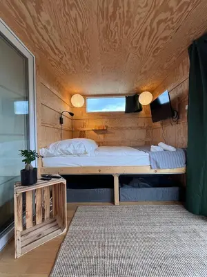 Ein Bett oder Betten in einem Zimmer der Unterkunft Berlin River Retreat