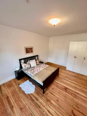 Ein Bett oder Betten in einem Zimmer der Unterkunft Ferienwohnung