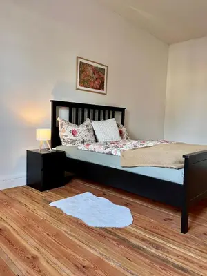 Ein Bett oder Betten in einem Zimmer der Unterkunft Ferienwohnung